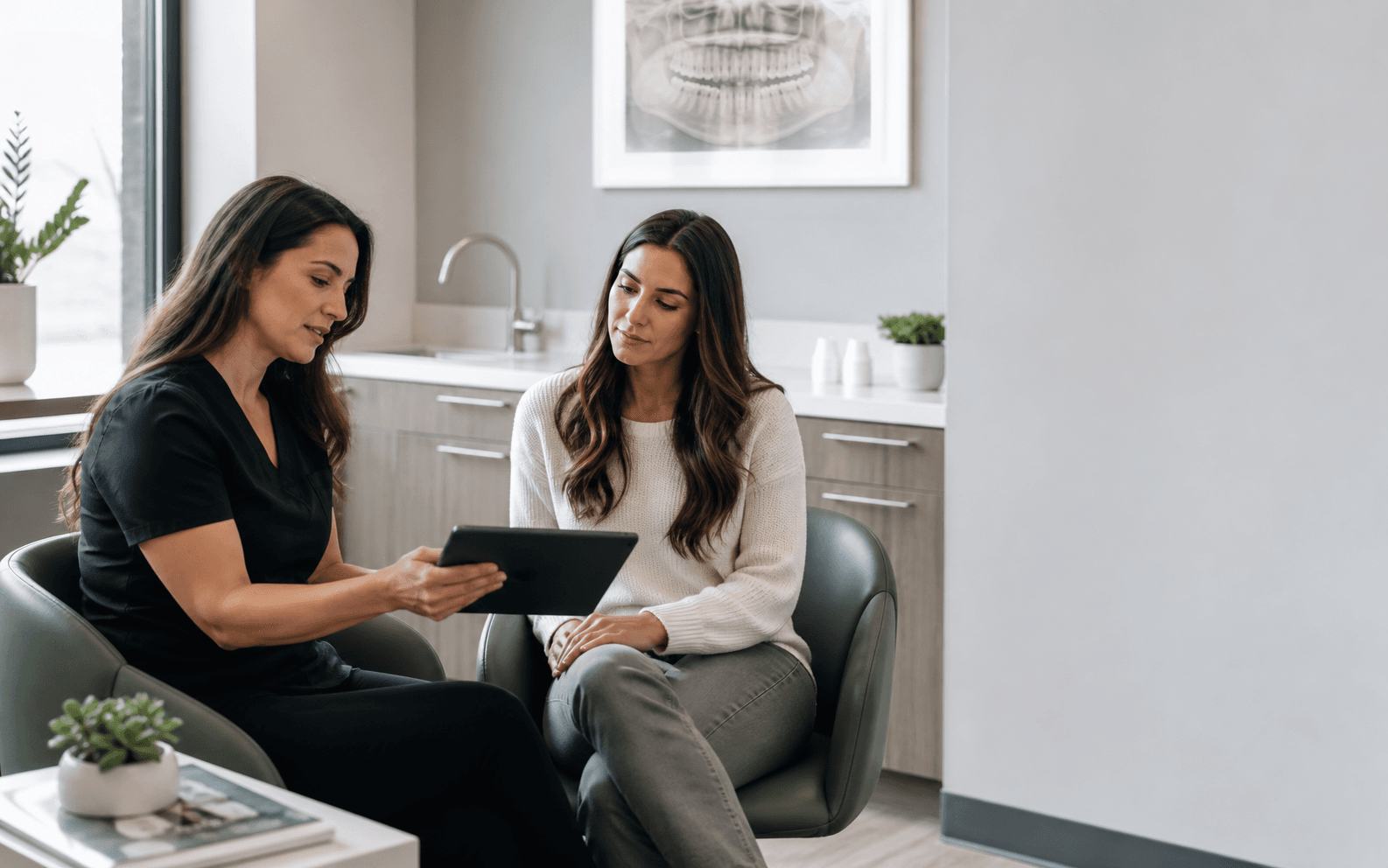 A practice coordinator explaining a treatment estimate to a patient